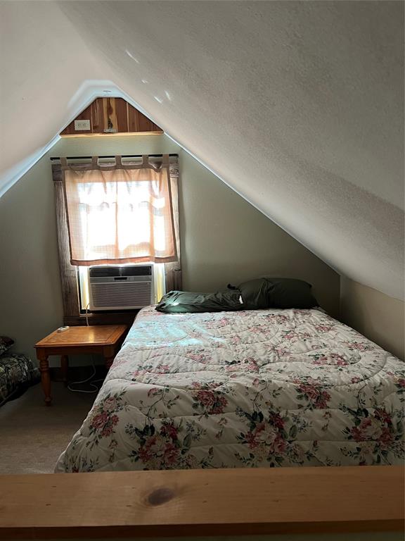 1921 Salt Creek Road Jacksboro, TX 76458 - Photo 18 of 37 a bedroom with a bed and a window