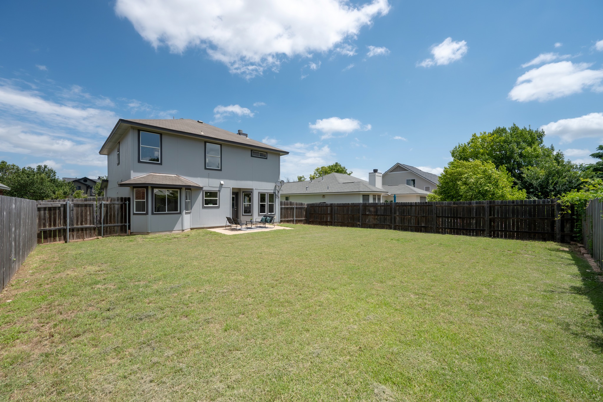 1504 Waterfall Avenue Leander, TX 78641 - Photo 21 of 25 A spacious backyard with plenty of room to make it your own.