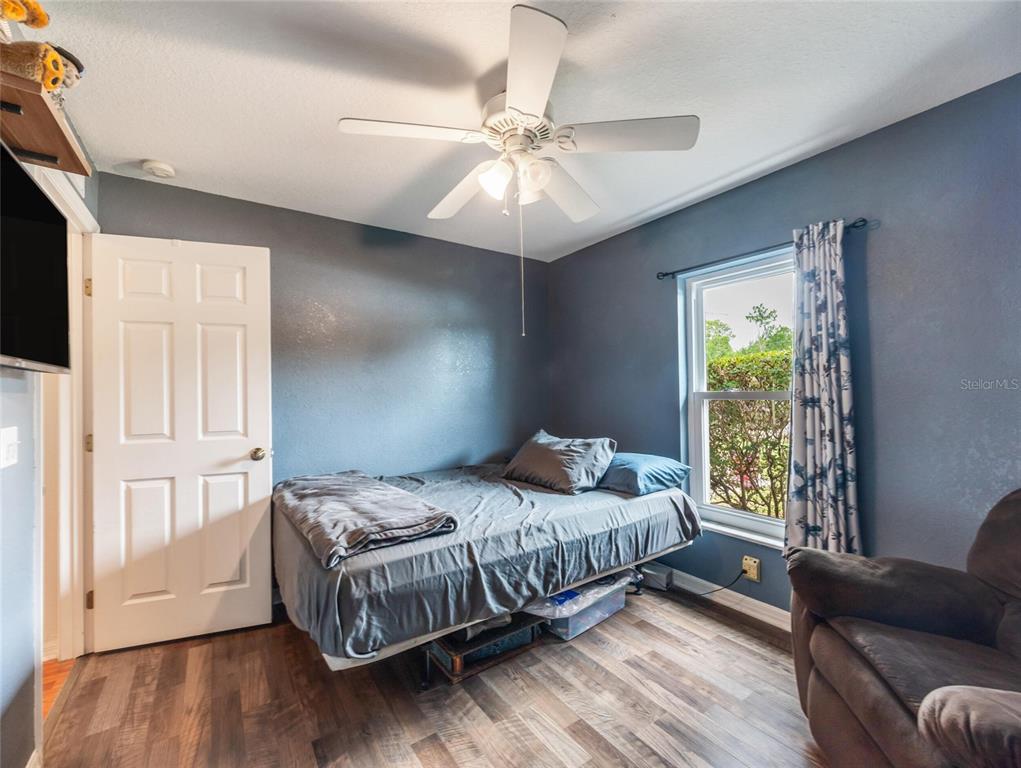 6724 Cherry Road Ocala, FL 34472 - Photo 13 of 29 a bedroom with a bed and window