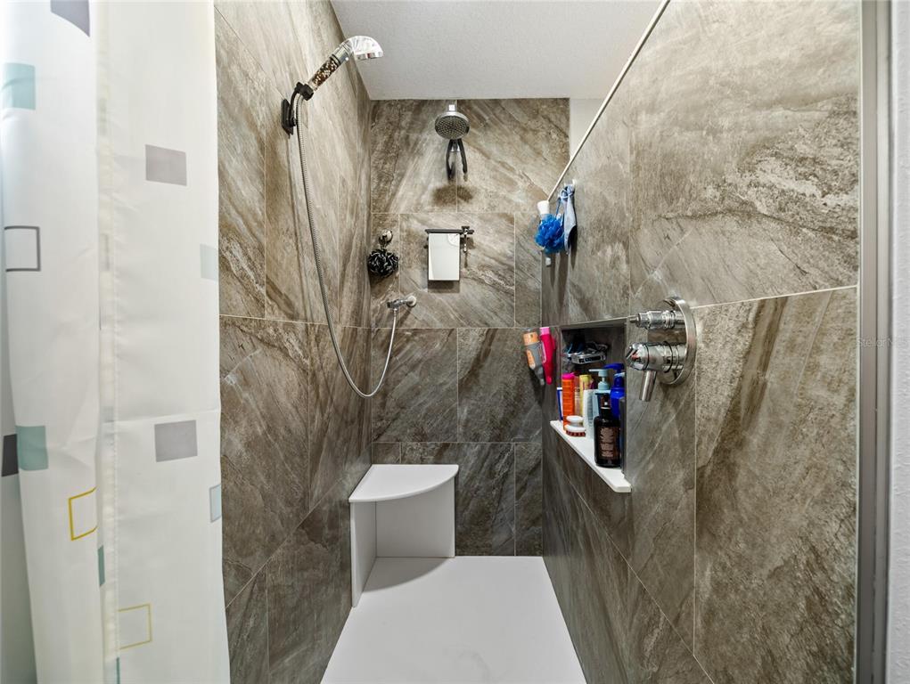 6724 Cherry Road Ocala, FL 34472 - Photo 23 of 29 a bathroom with a toilet and a shower