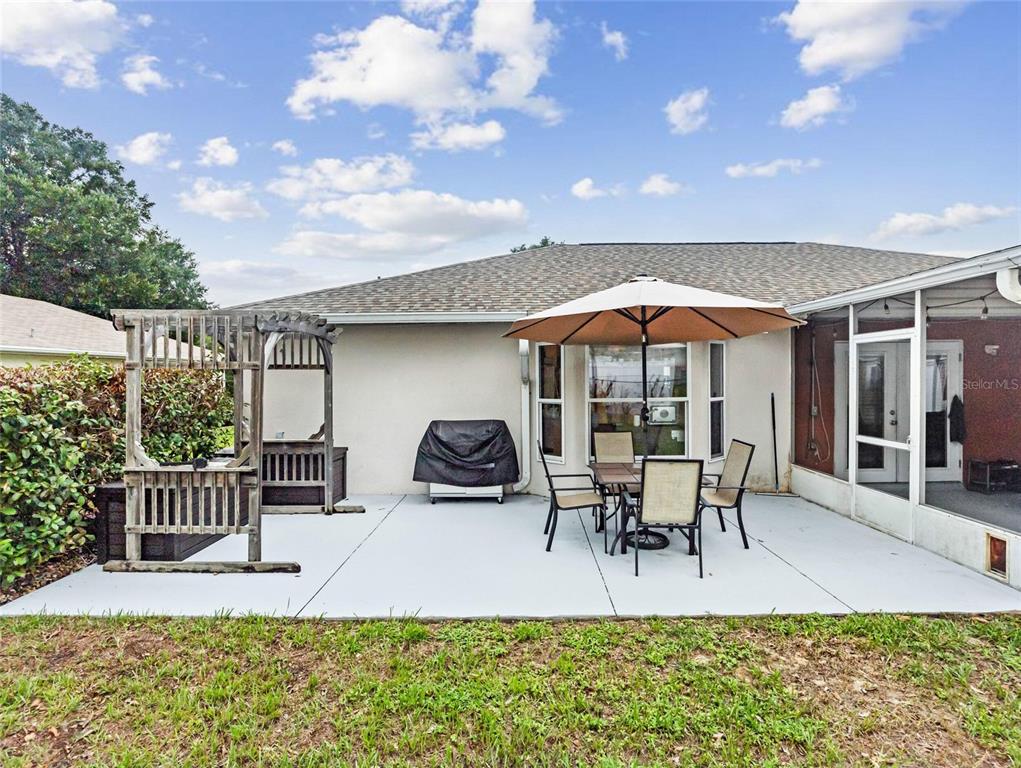 6724 Cherry Road Ocala, FL 34472 - Photo 27 of 29 a patio with couches and table