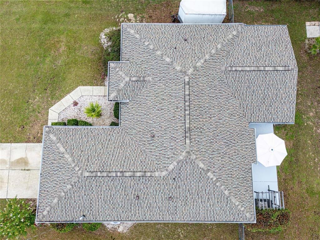 6724 Cherry Road Ocala, FL 34472 - Photo 4 of 29 a aerial view of a house with a garden