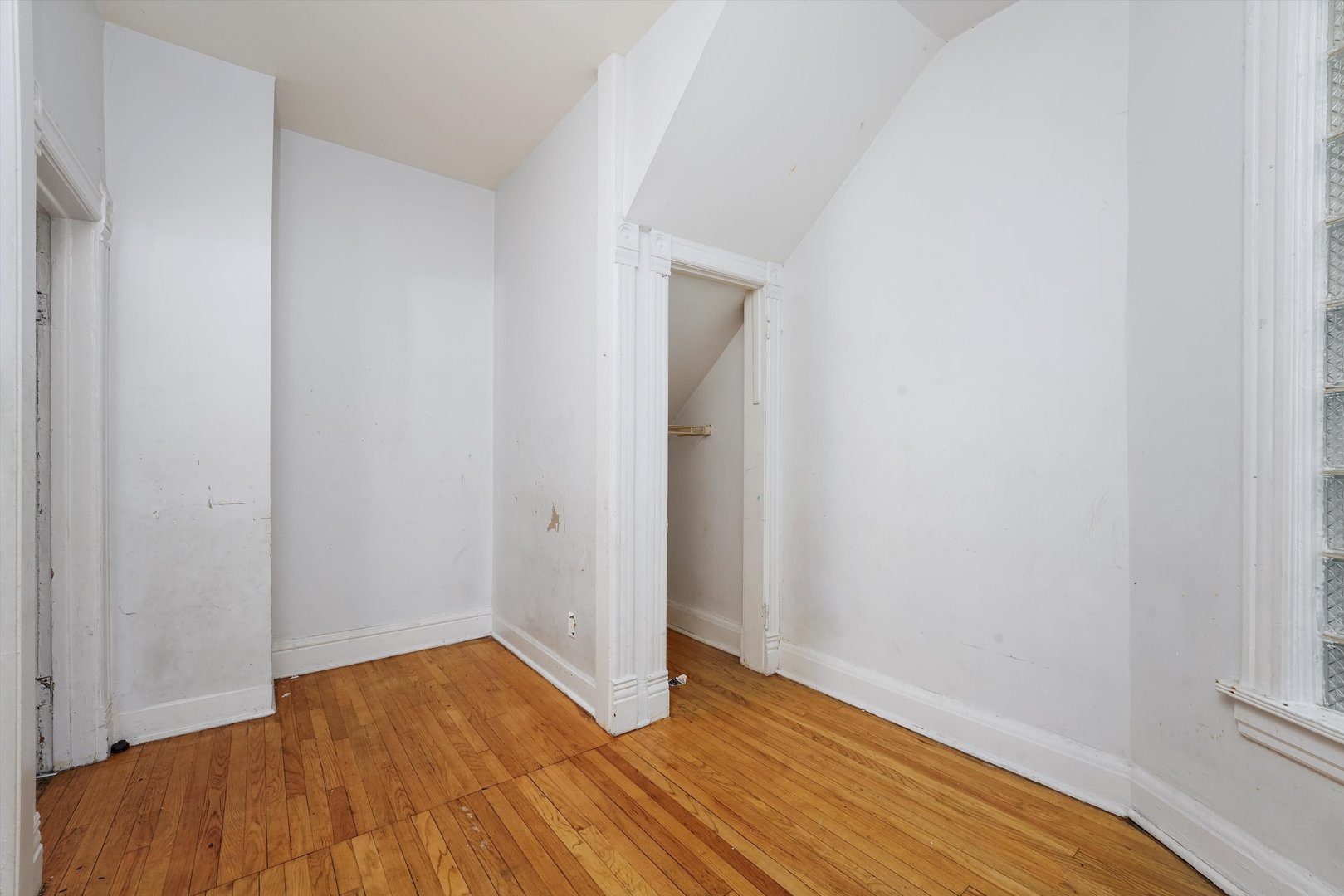 58 West 72nd Street Chicago, IL 60621 - Photo 6 of 28 a view of empty room with wooden floor