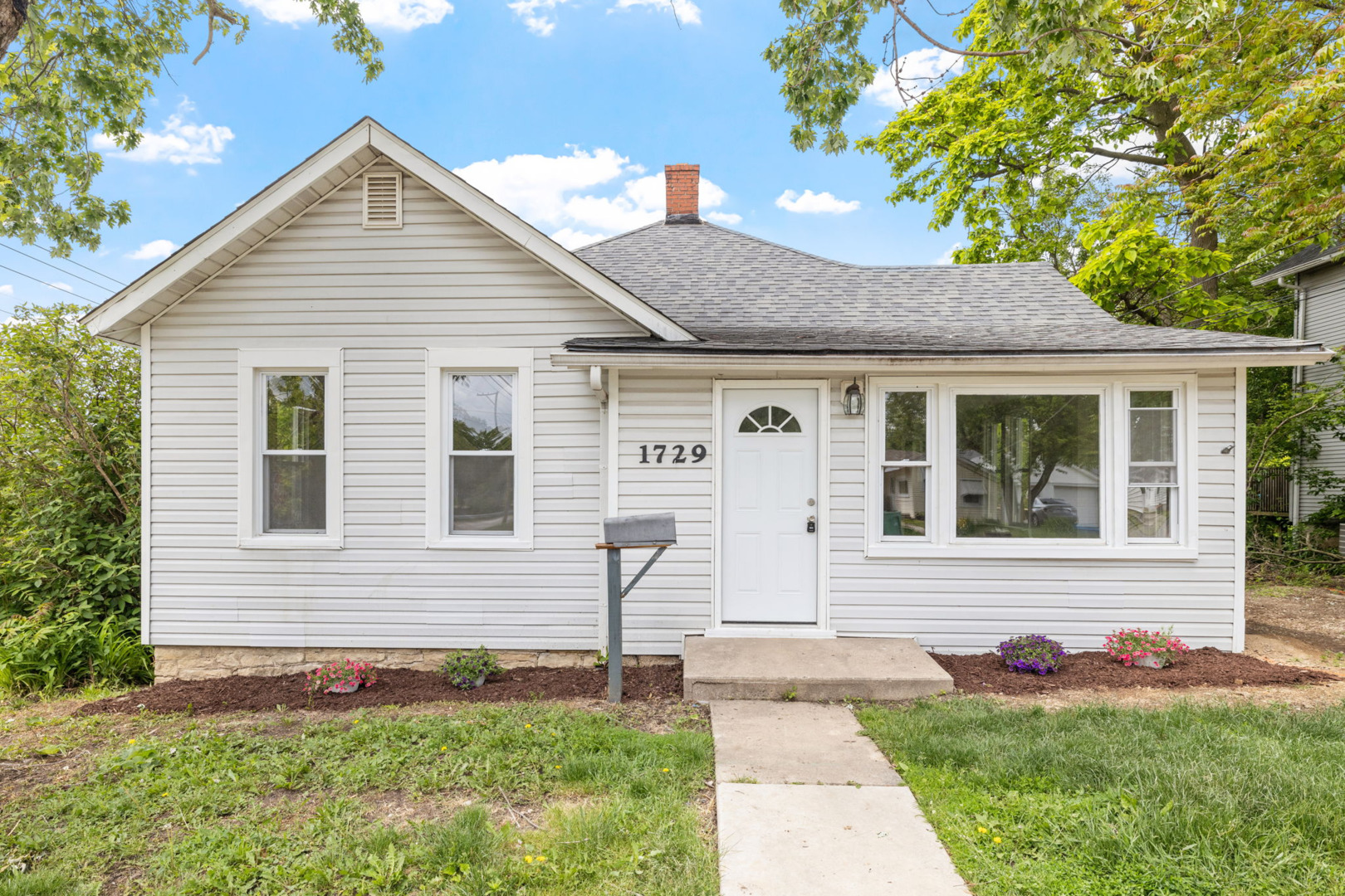 1729 South Hamilton Street Lockport, IL 60441 - Photo 1 of 18 a view of a house with a yard