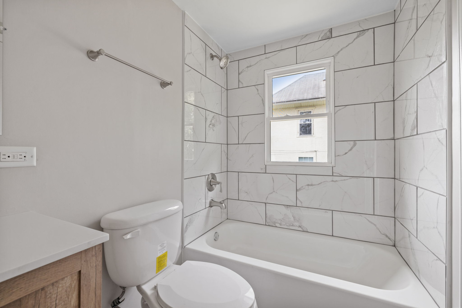 1729 South Hamilton Street Lockport, IL 60441 - Photo 15 of 18 a bath room with a toilet and a bath tub