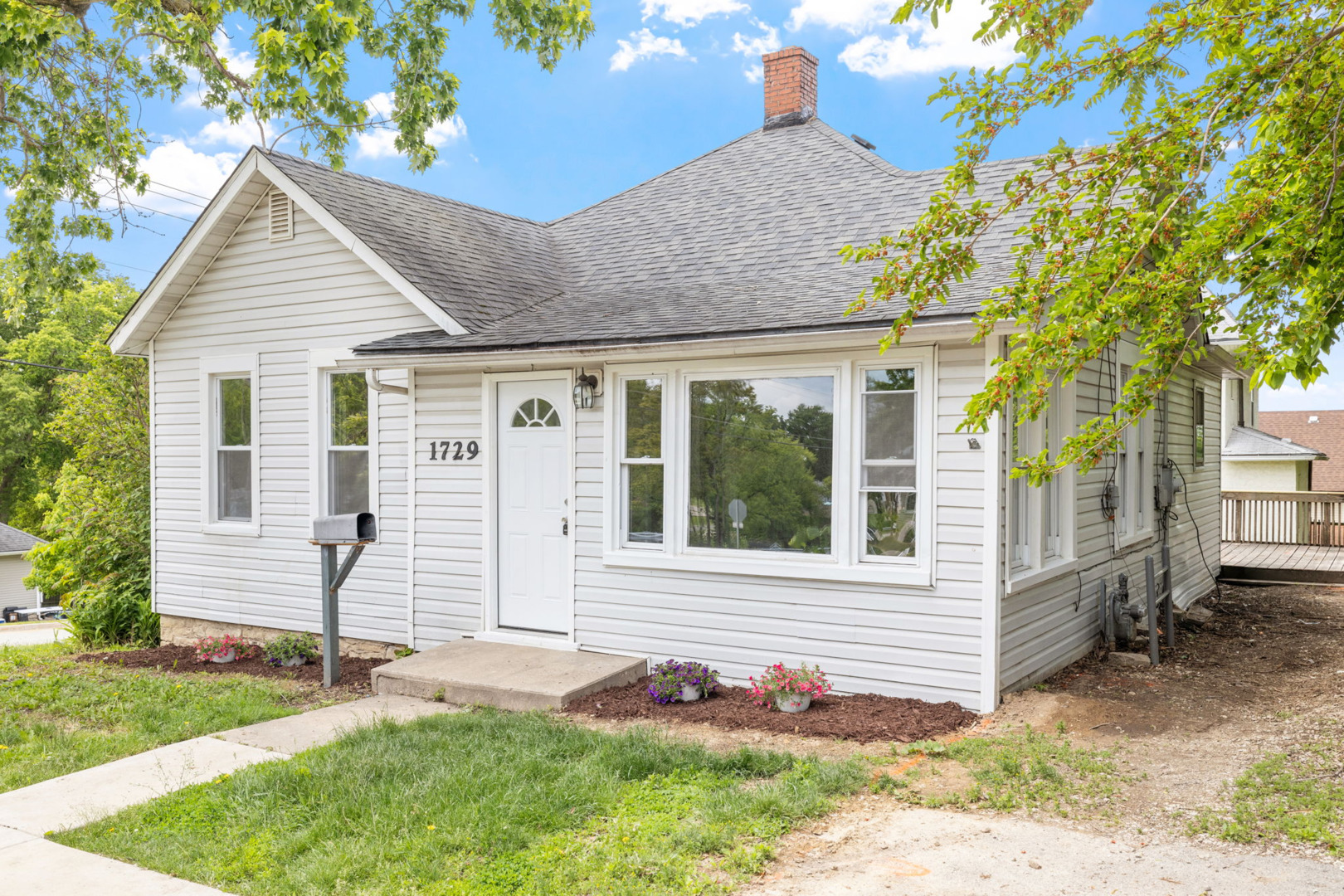 1729 South Hamilton Street Lockport, IL 60441 - Photo 2 of 18 a view of a house with a yard