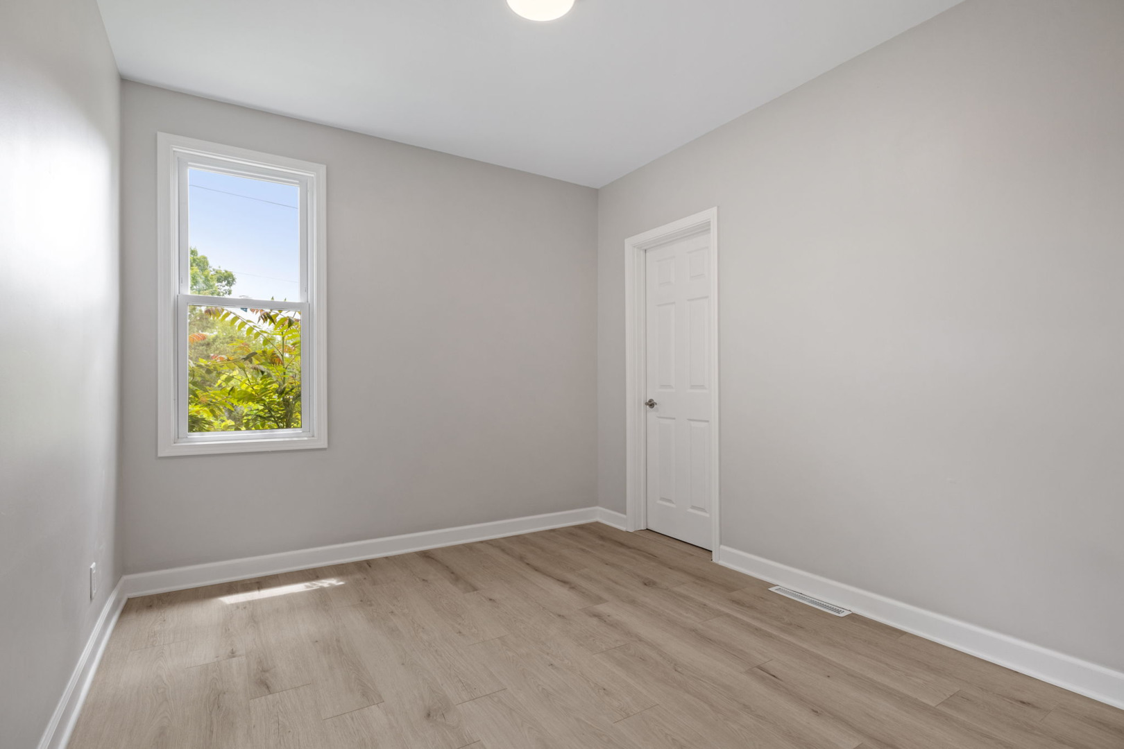 1729 South Hamilton Street Lockport, IL 60441 - Photo 7 of 18 a view of an empty room with window
