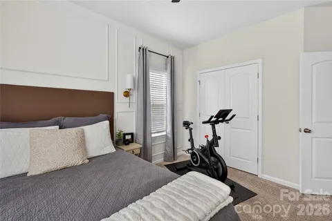 a bed room with a bed and a table