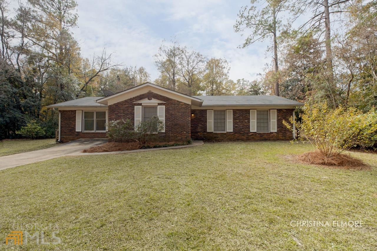 1404 Main Street Perry, GA 31069 - Photo 1 of 1 a view of a house with a backyard