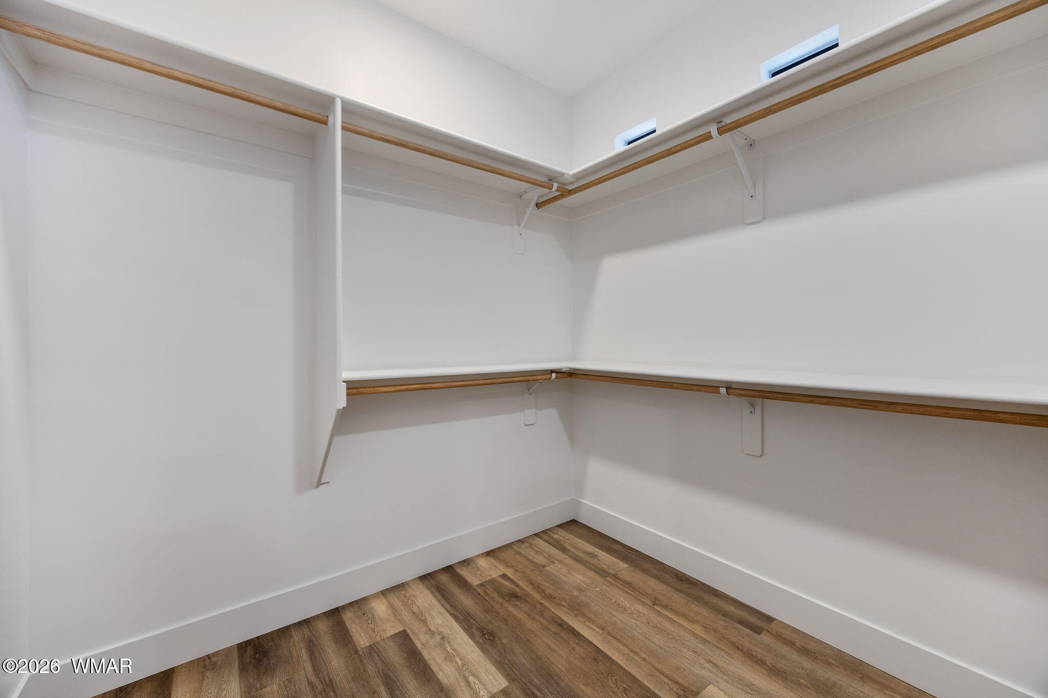 561 South Rock Ridge Drive Show Low, AZ 85901 - Photo 13 of 28 a view of an empty walk in closet