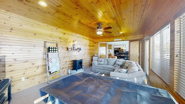 a bathroom with a double vanity sink a mirror and a bathtub