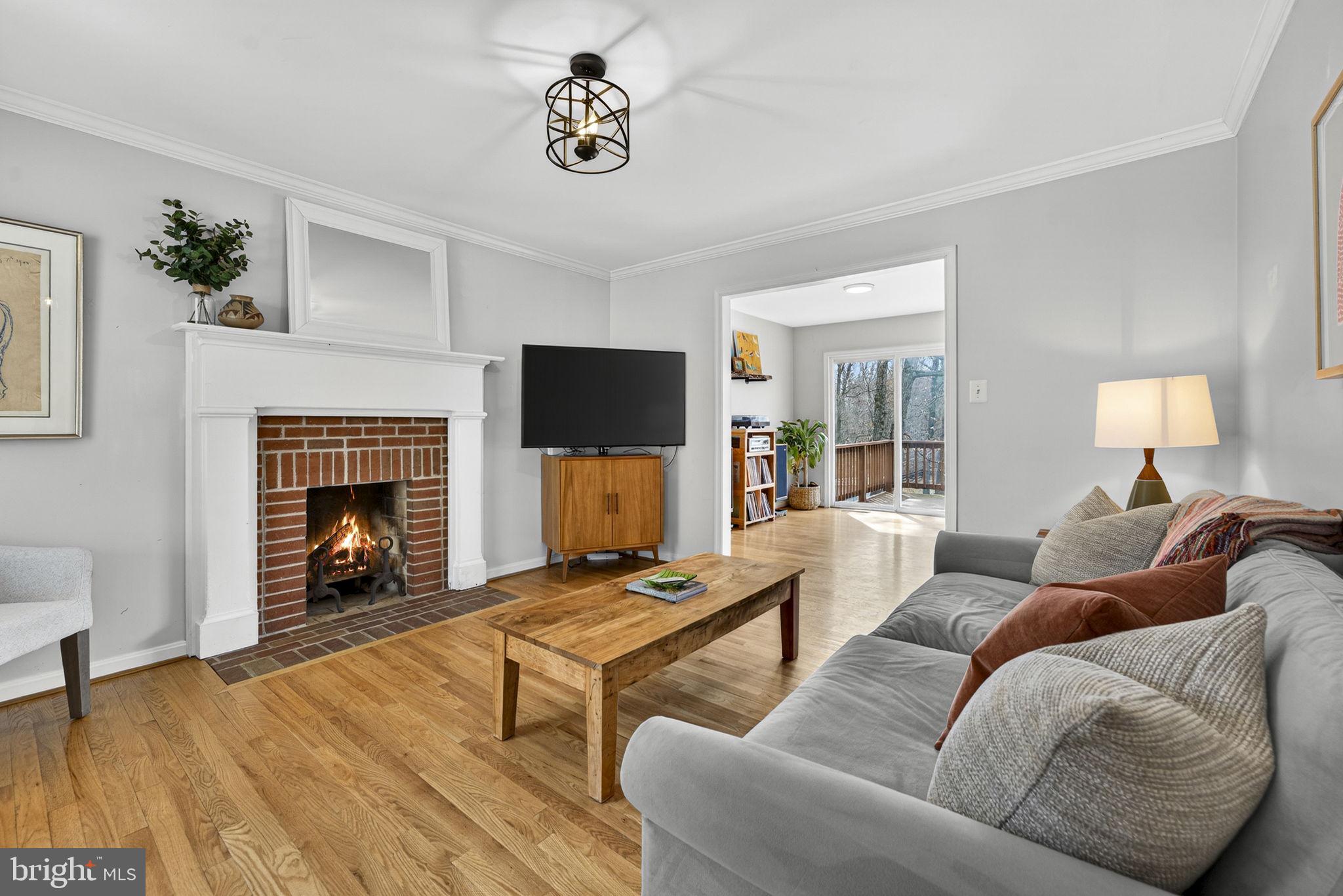 10507 Cliff Mills Road Marshall, VA 20115 - Photo 11 of 56 a living room with furniture and a fireplace
