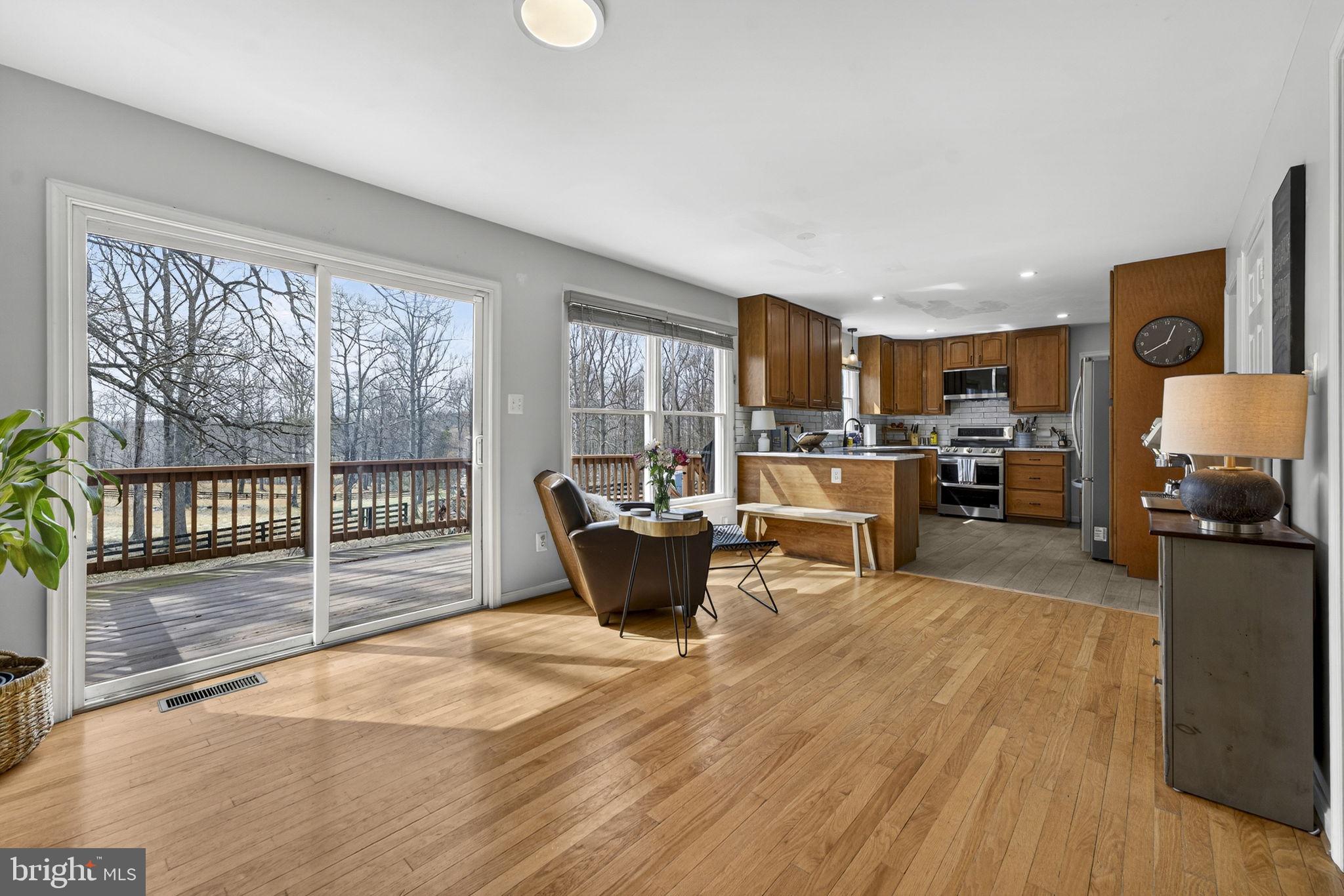 10507 Cliff Mills Road Marshall, VA 20115 - Photo 12 of 56 a living room with furniture and a wooden floor