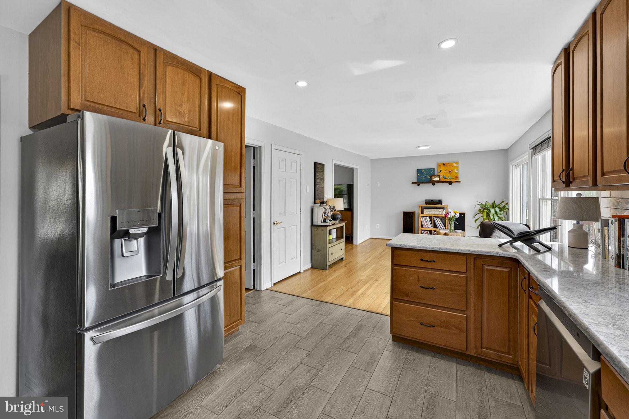 10507 Cliff Mills Road Marshall, VA 20115 - Photo 19 of 56 a kitchen with stainless steel appliances granite countertop a refrigerator sink and cabinets