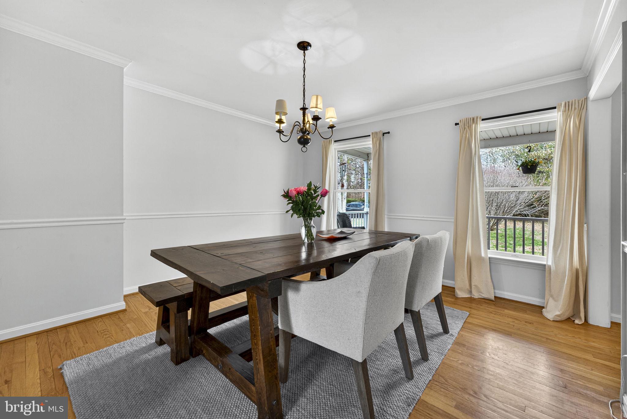 10507 Cliff Mills Road Marshall, VA 20115 - Photo 21 of 56 a view of a dining room with furniture window and wooden floor