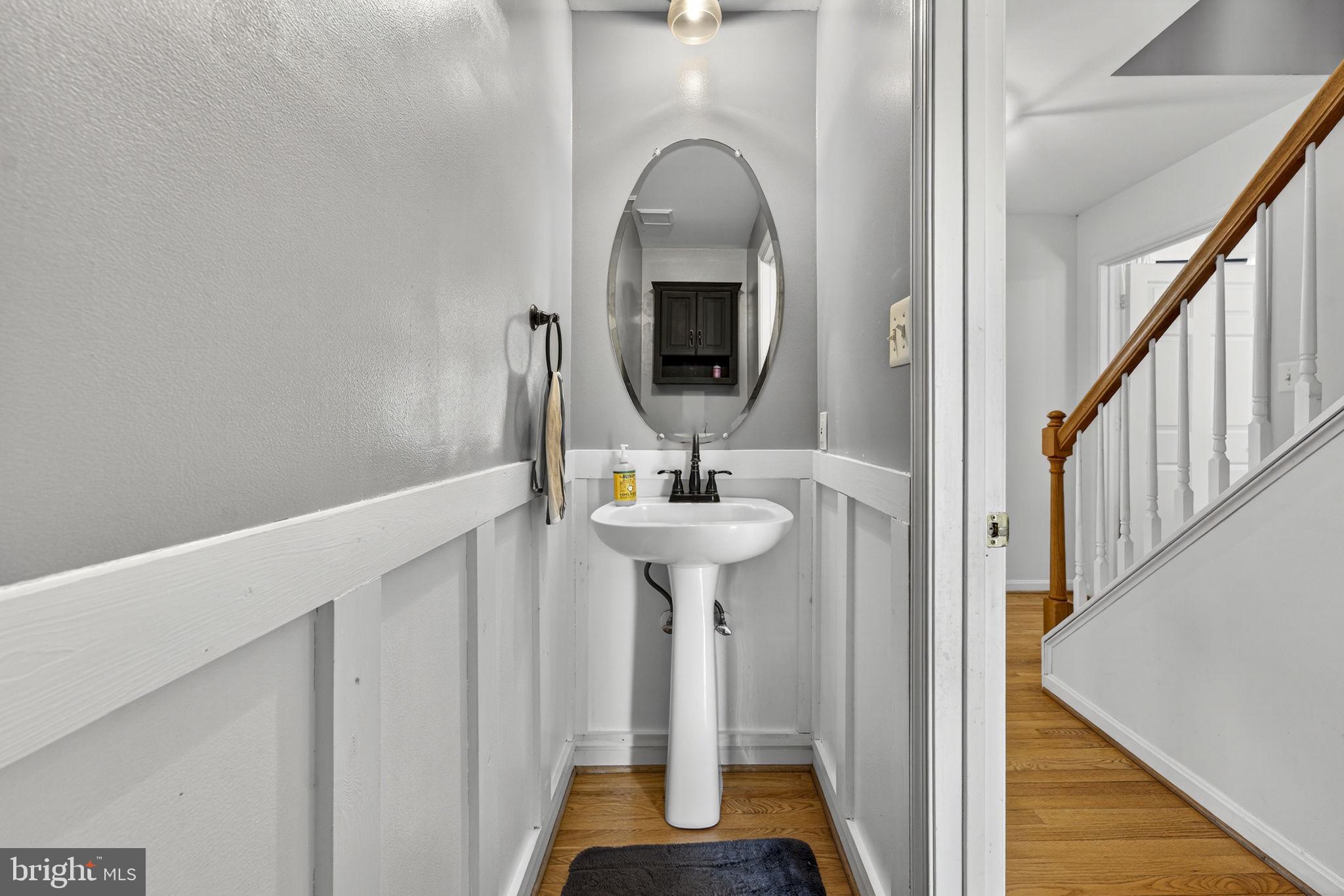 10507 Cliff Mills Road Marshall, VA 20115 - Photo 25 of 56 a bathroom with a sink and a mirror