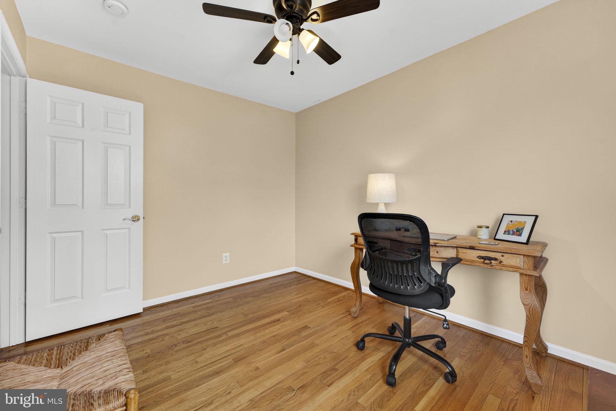 10507 Cliff Mills Road Marshall, VA 20115 - Photo 27 of 56 a view of workspace with wooden floor windows