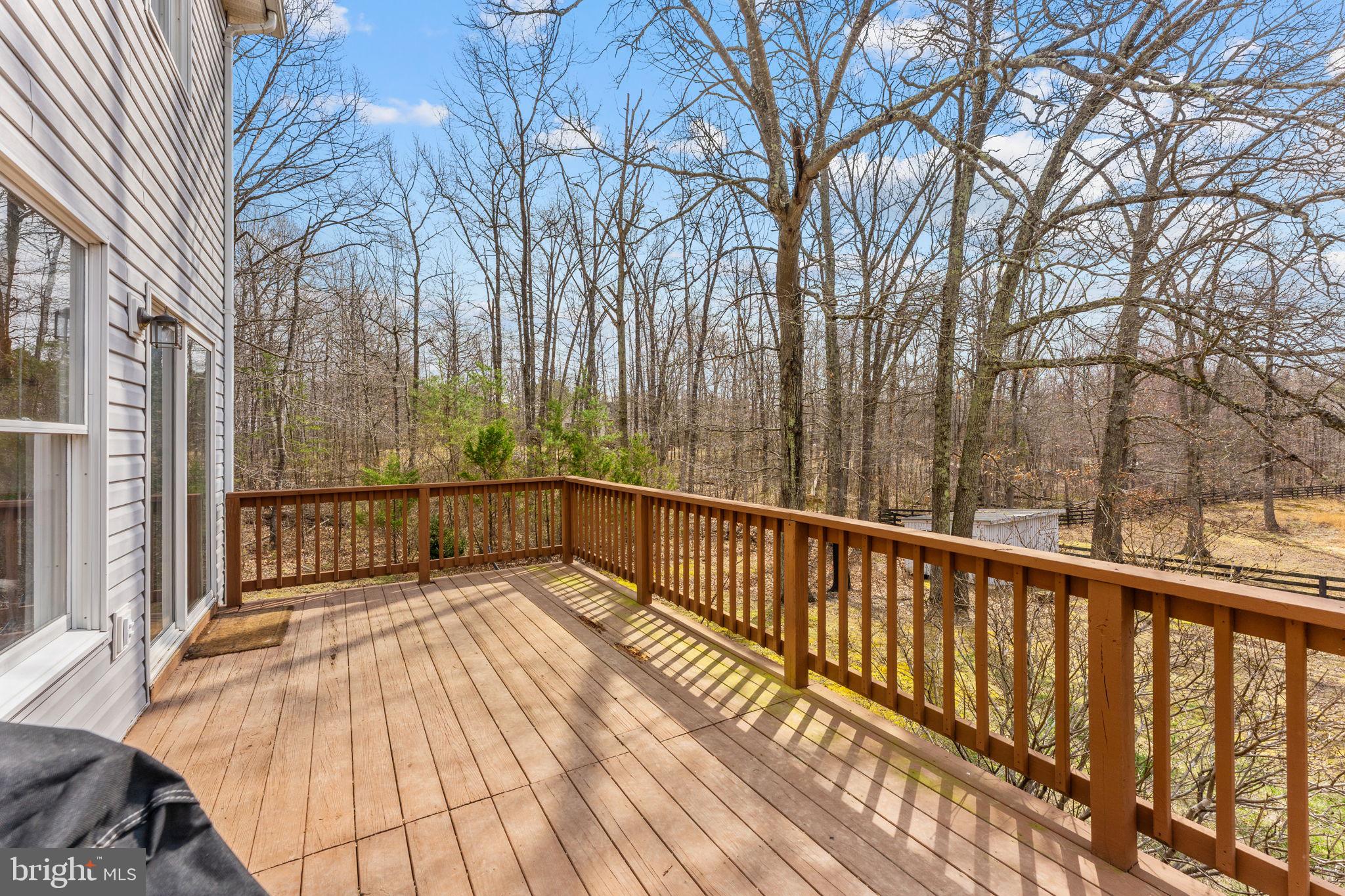 10507 Cliff Mills Road Marshall, VA 20115 - Photo 50 of 56 a view of balcony with wooden floor and fence