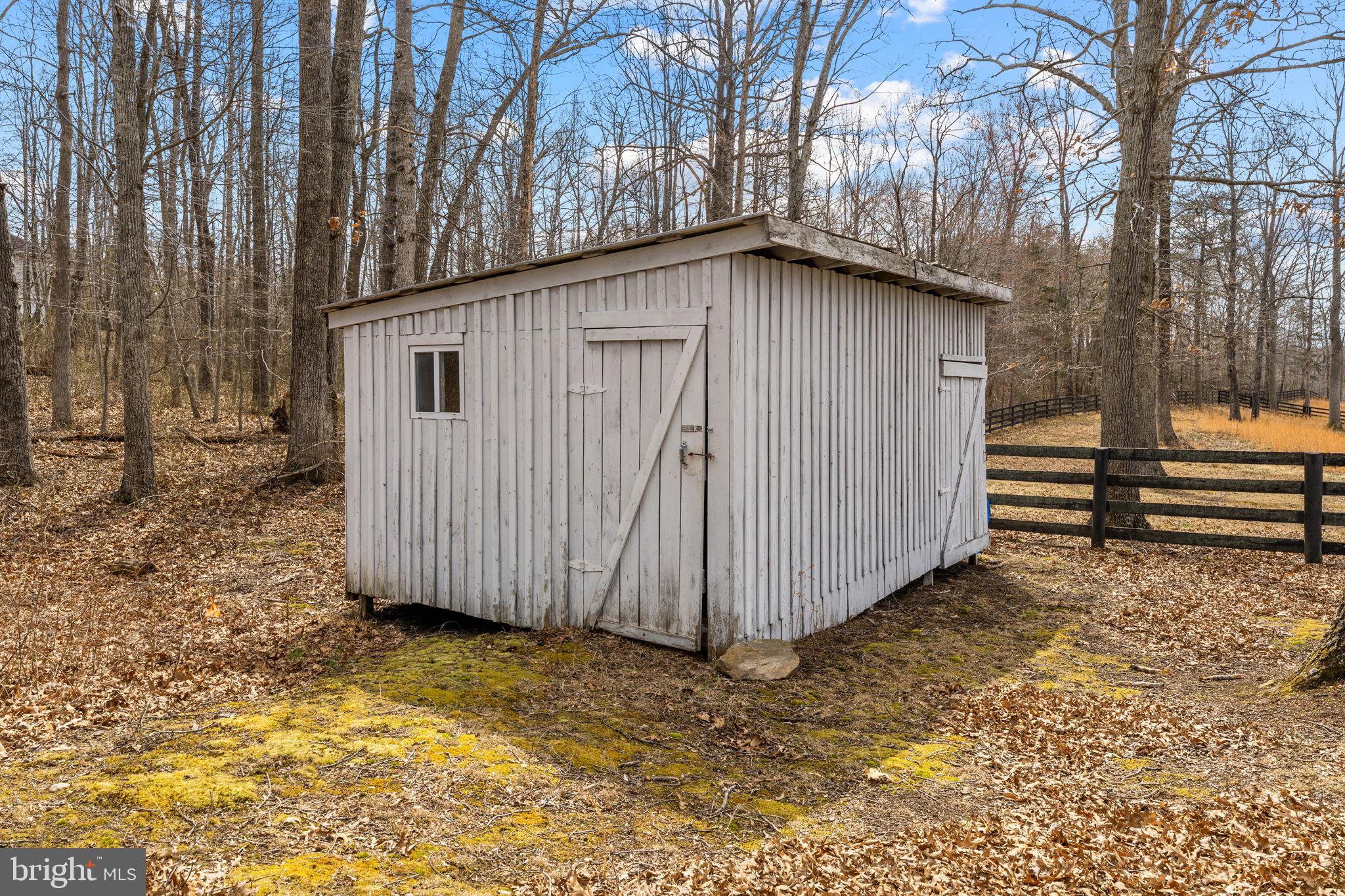 10507 Cliff Mills Road Marshall, VA 20115 - Photo 55 of 56 a view of a house with a backyard