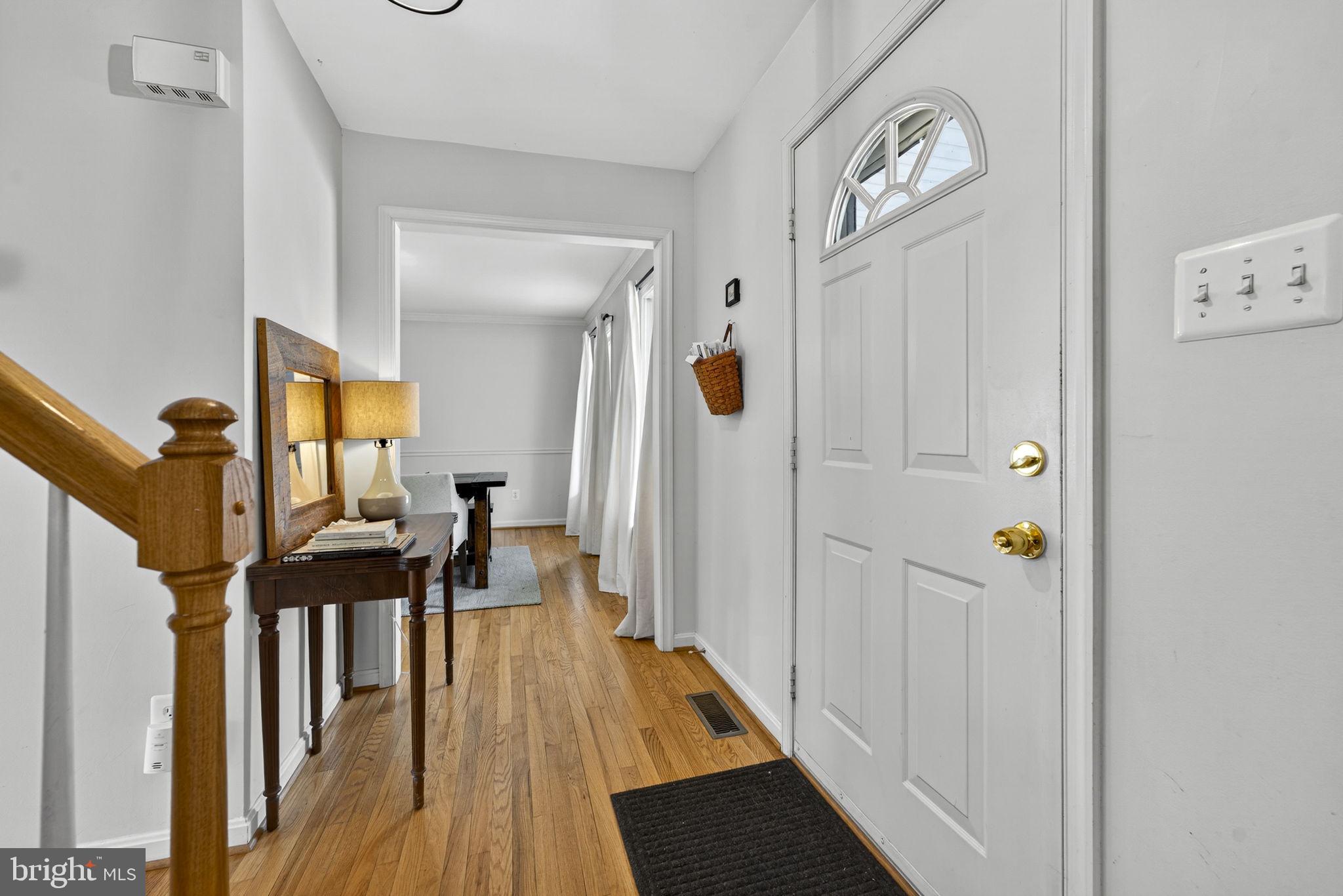 10507 Cliff Mills Road Marshall, VA 20115 - Photo 7 of 56 a view of a hallway view with wooden floor and staircase