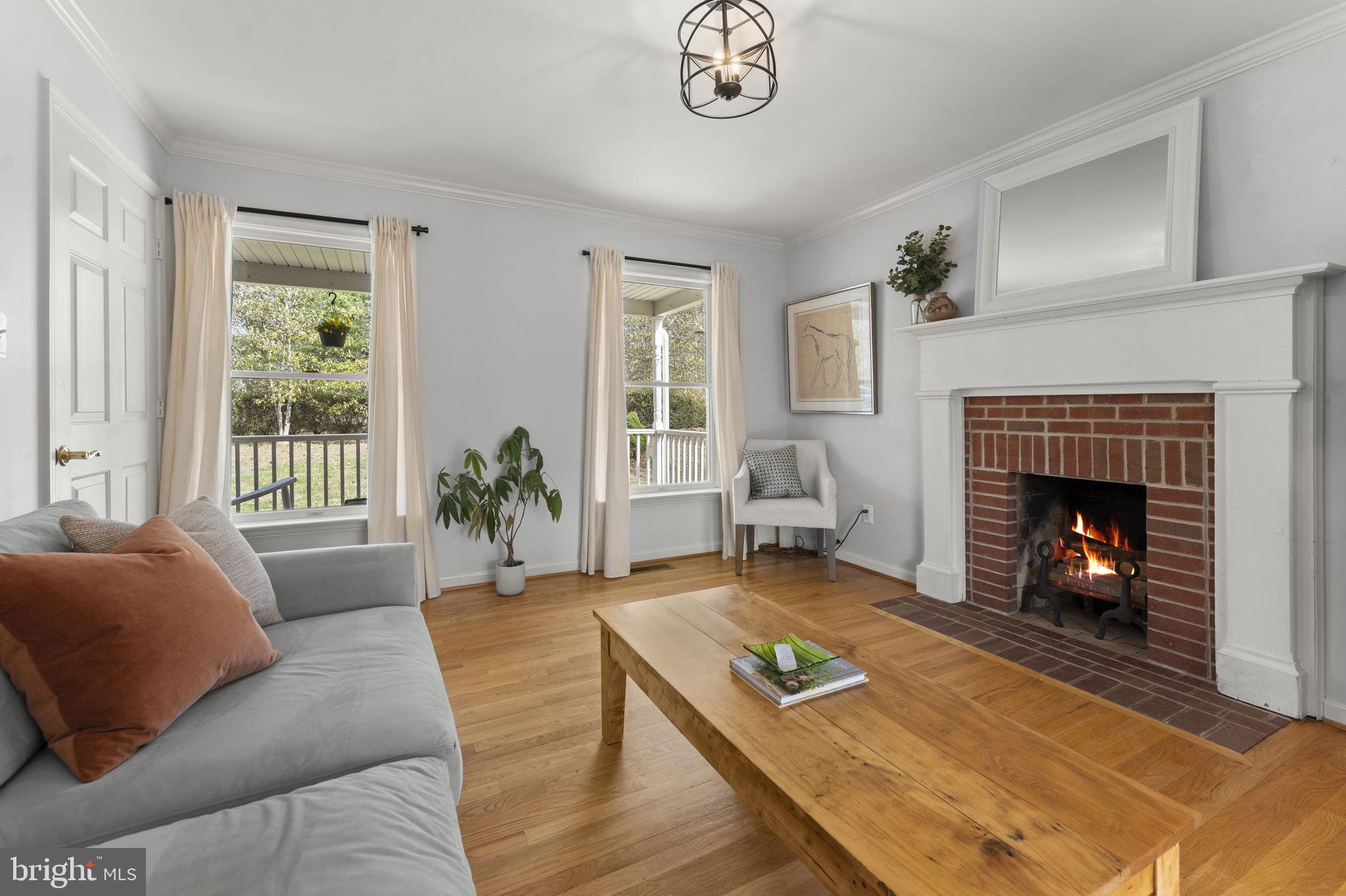 10507 Cliff Mills Road Marshall, VA 20115 - Photo 9 of 56 a living room with furniture and a fireplace