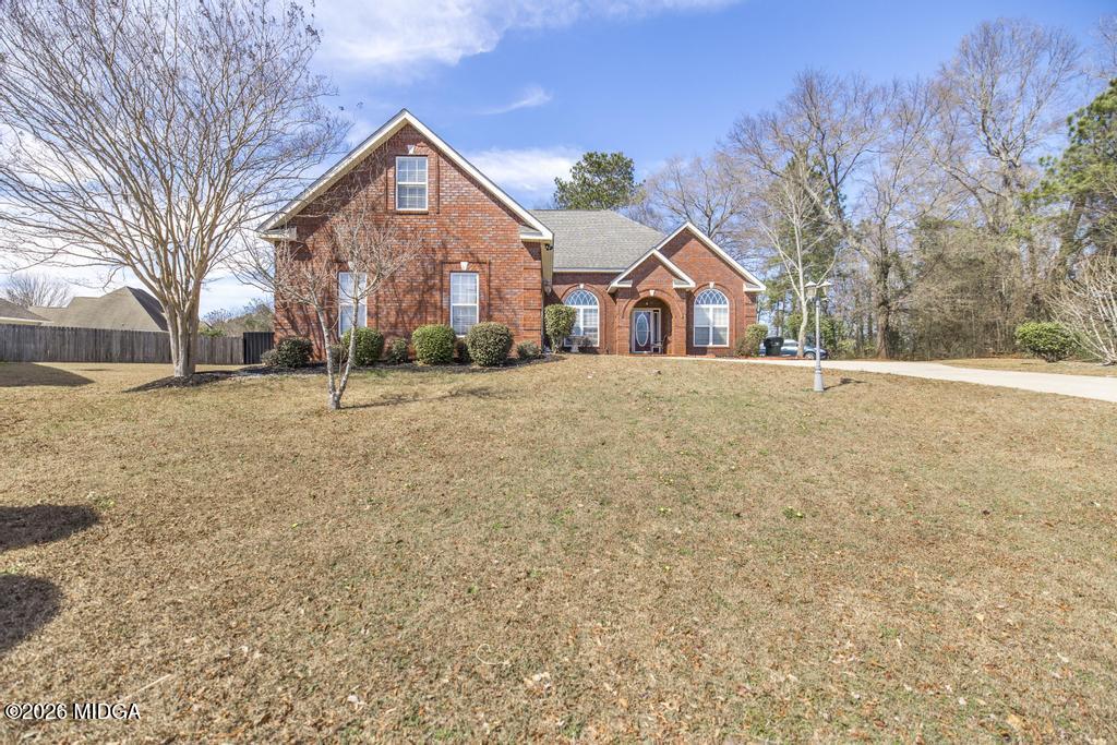 80 Mallard Pointe Kathleen, GA 31047 - Photo 3 of 34 a front view of a house with a yard