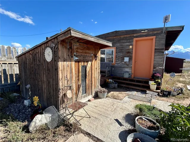 a view of a house with roof yard