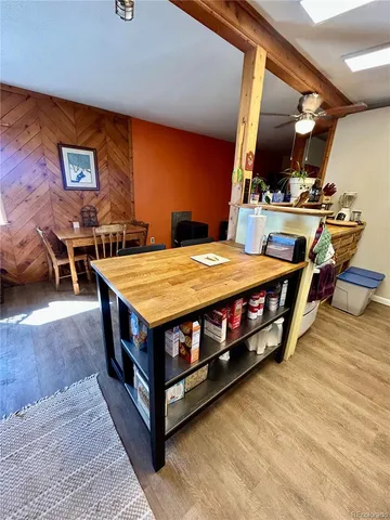 a room with furniture and flat screen tv