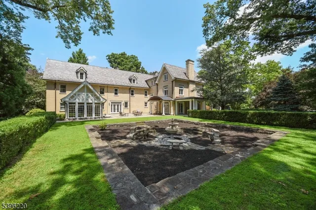 a kitchen with stainless steel appliances granite countertop a stove a sink dishwasher and a refrigerator