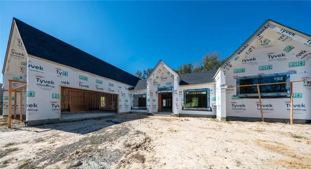 a view of a livingroom with a flat screen tv