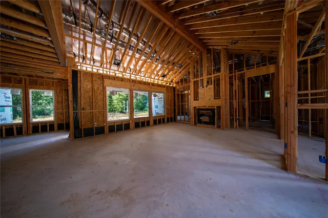 a view of a room with wooden walls