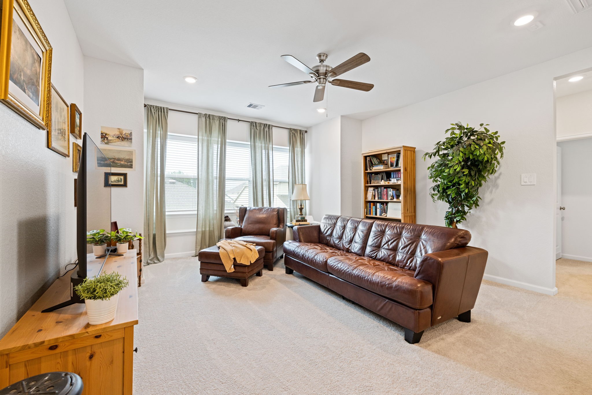 18323 Tiger Flowers Drive Conroe, TX 77302 - Photo 24 of 49 Spacious, sunlit gameroom upstairs.