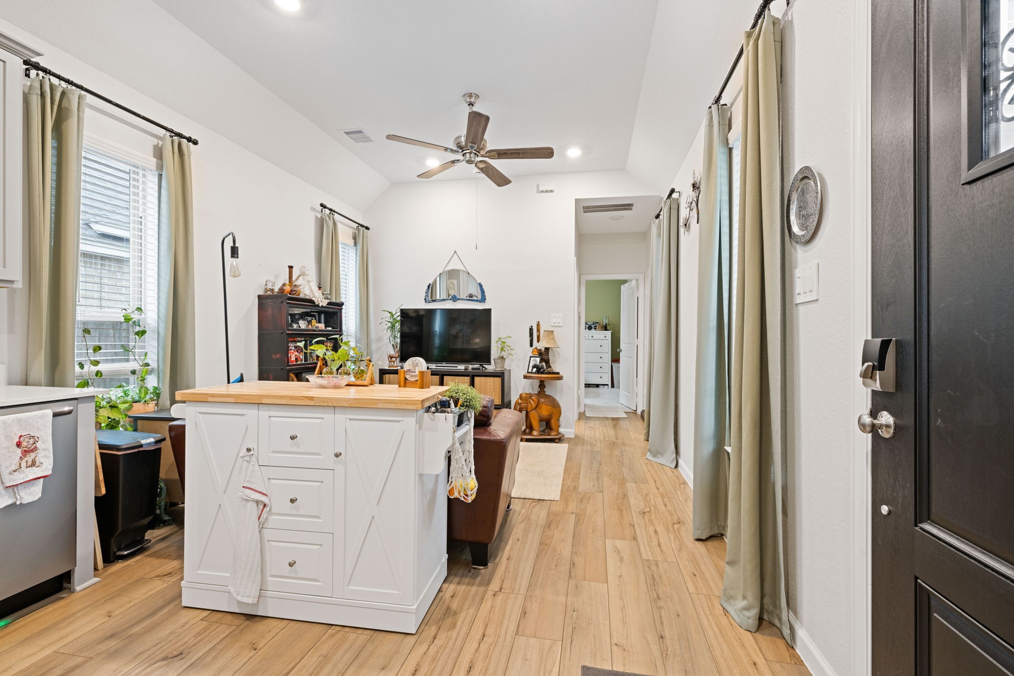 18323 Tiger Flowers Drive Conroe, TX 77302 - Photo 32 of 49 Bright, airy living area with open layout.