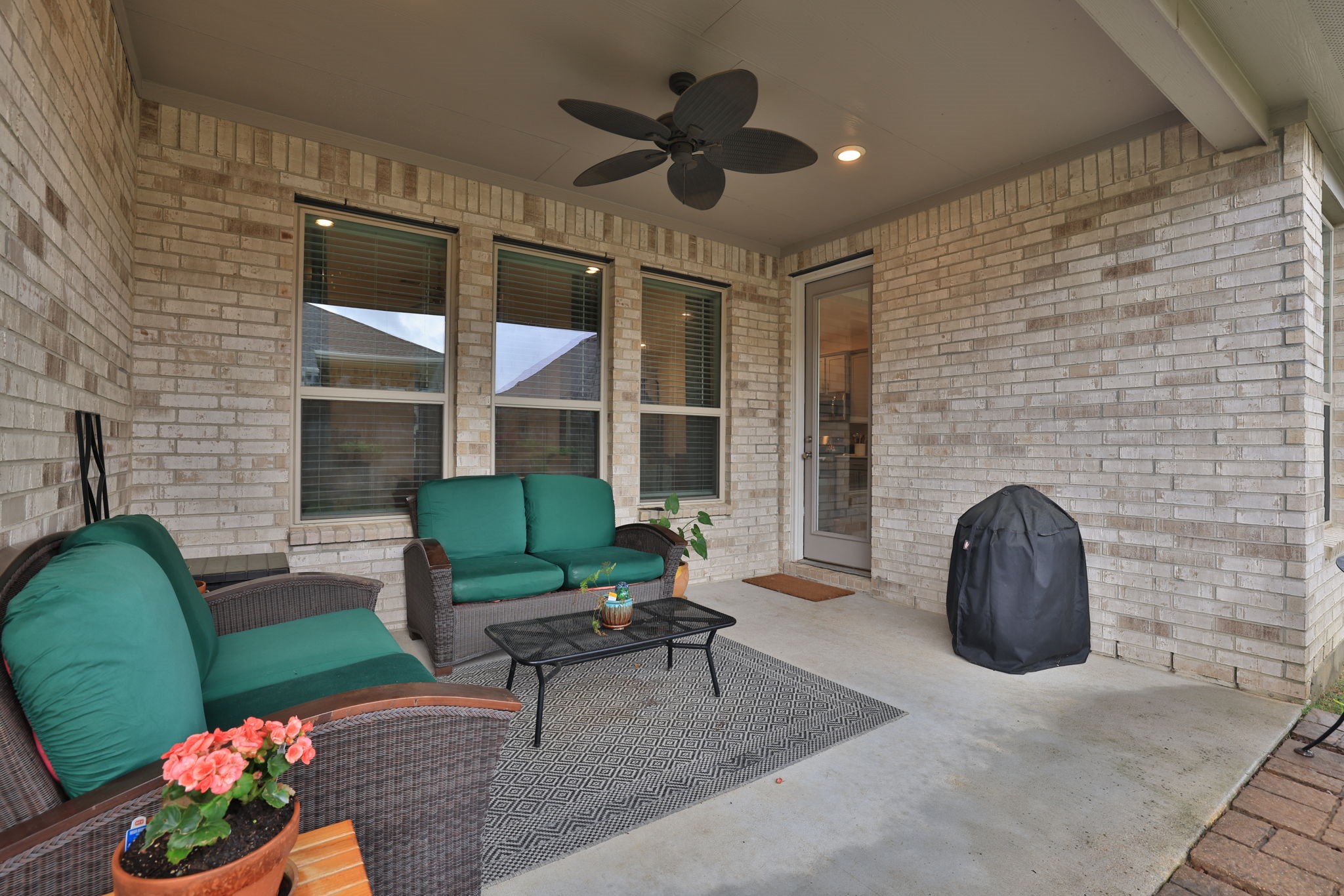 18323 Tiger Flowers Drive Conroe, TX 77302 - Photo 41 of 49 A generous patio perfect for unwinding.