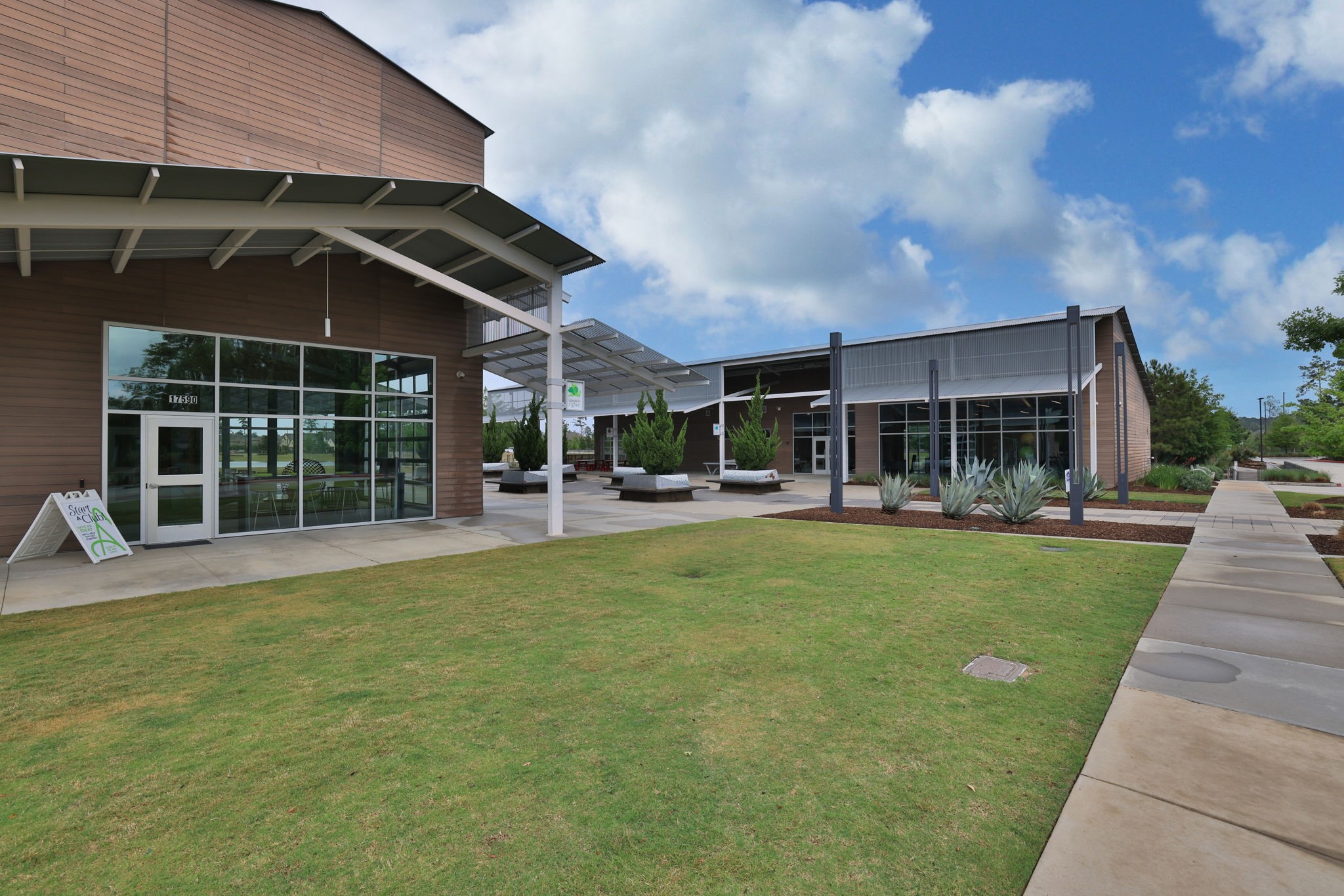 18323 Tiger Flowers Drive Conroe, TX 77302 - Photo 47 of 49 Experience ultimate convenience with a clubhouse, fitness center, and restaurant just steps away.