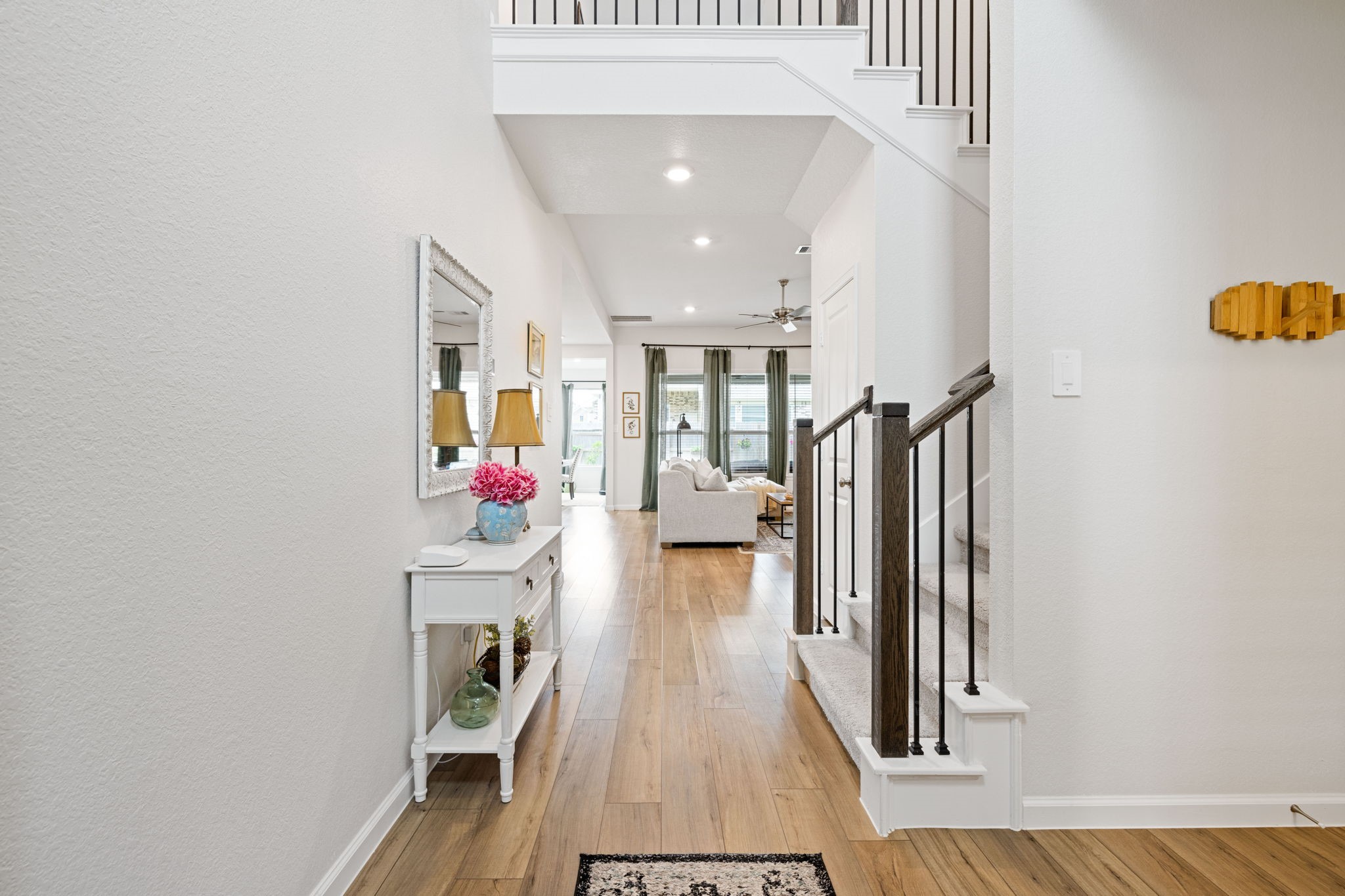 18323 Tiger Flowers Drive Conroe, TX 77302 - Photo 6 of 49 Step into this inviting and luminous entryway.