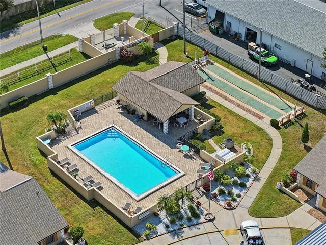 a view of a tennis ground with a table
