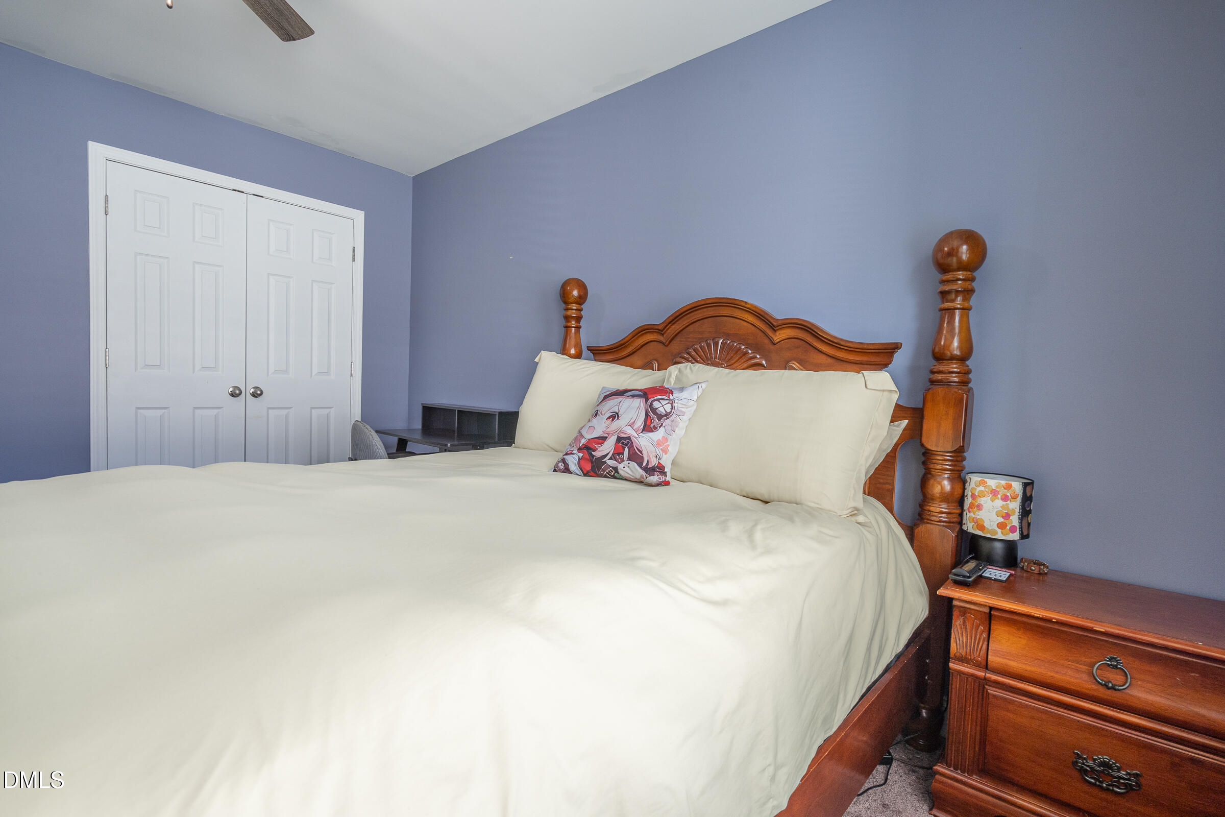 2756 Shepherd Valley Street Raleigh, NC 27610 - Photo 21 of 30 a bedroom with a bed and a dresser