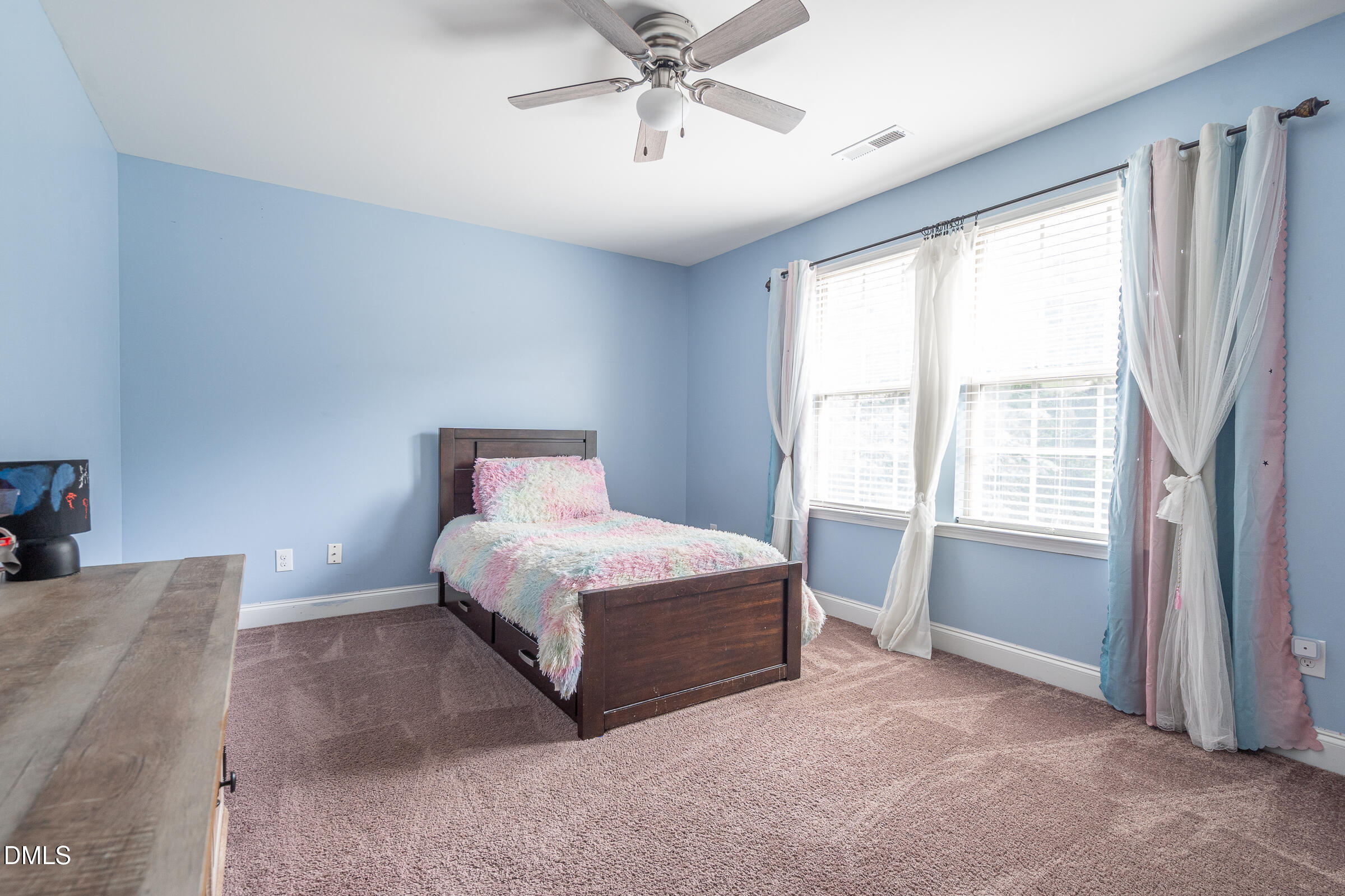 2756 Shepherd Valley Street Raleigh, NC 27610 - Photo 22 of 30 a bedroom with a bed and window