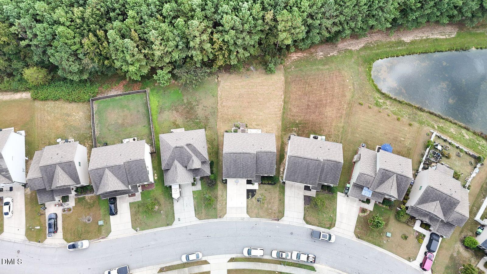 2756 Shepherd Valley Street Raleigh, NC 27610 - Photo 27 of 30 an aerial view of houses with outdoor space