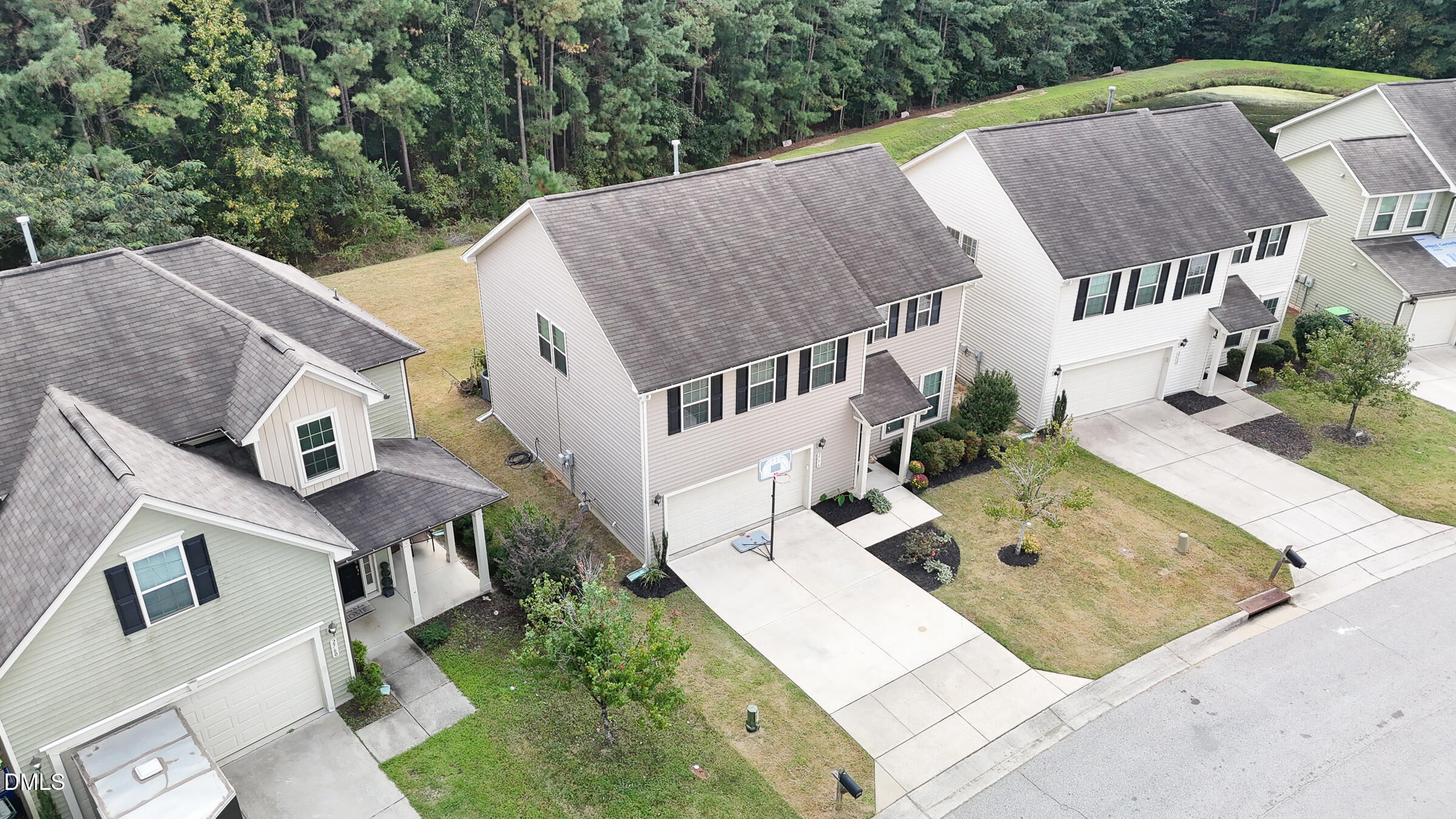 2756 Shepherd Valley Street Raleigh, NC 27610 - Photo 28 of 30 a aerial view of a house with a yard
