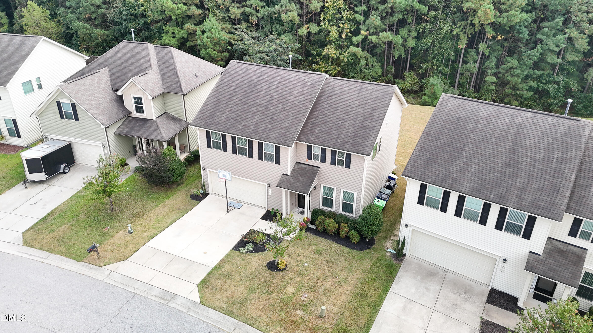 2756 Shepherd Valley Street Raleigh, NC 27610 - Photo 30 of 30 a view of multiple houses with a yard