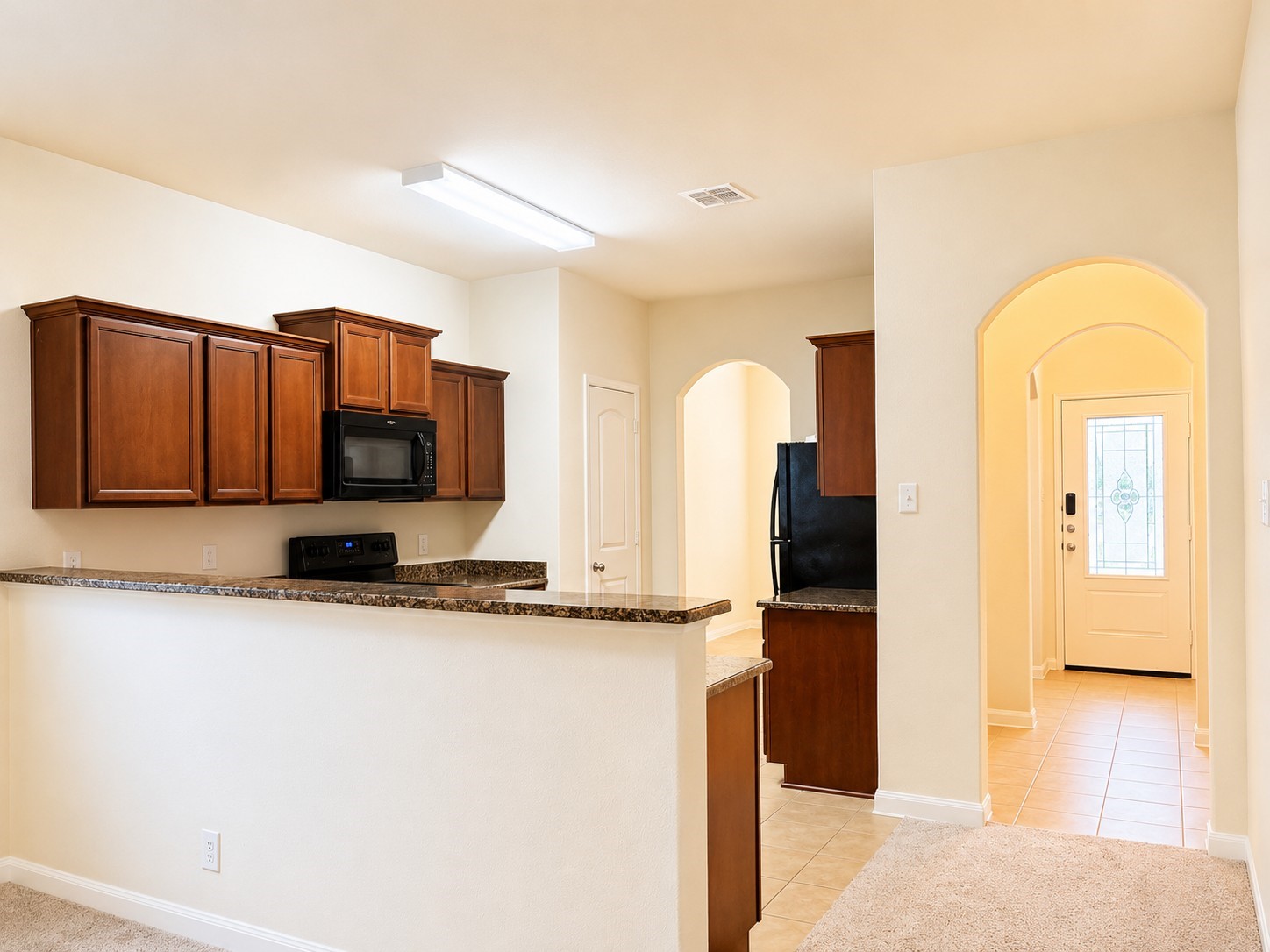 7599 Fettle Lane Conroe, TX 77304 - Photo 5 of 15 a bathroom with a sink a mirror and a bathtub