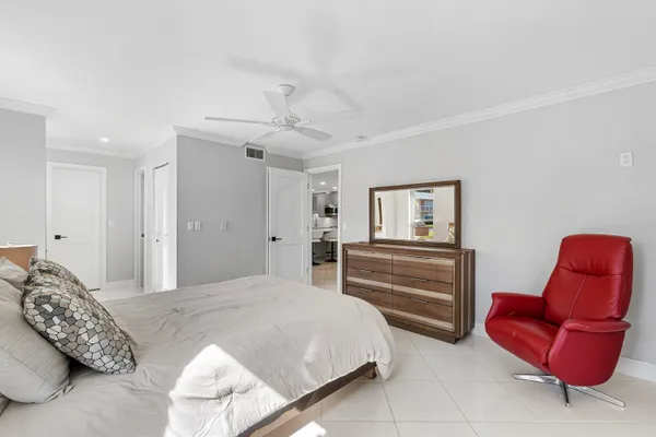 a bedroom with a bed and furniture