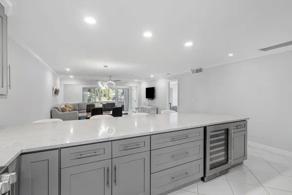 a view of counter top space sink and mirror