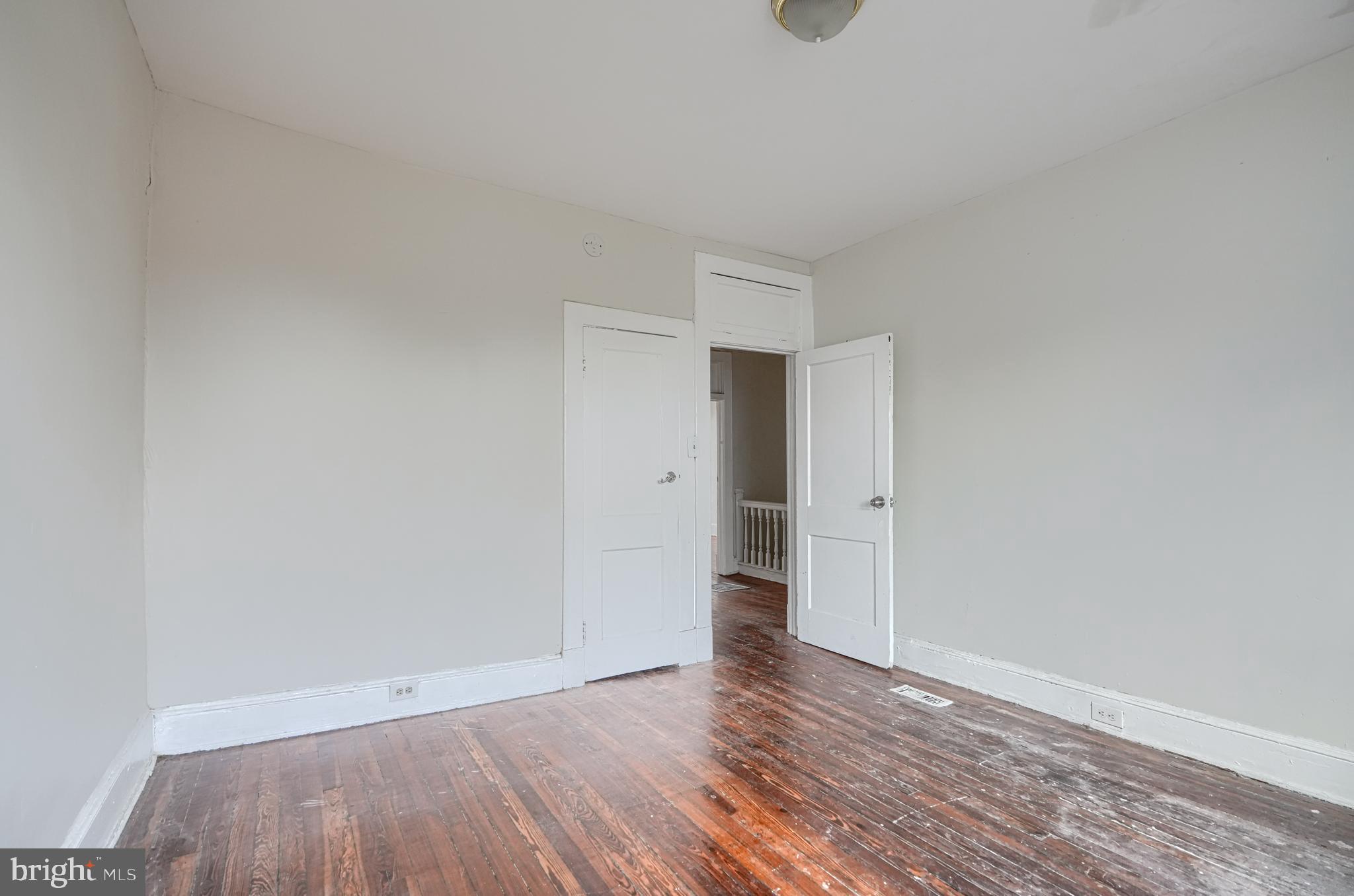 4806 Reisterstown Road Baltimore, MD 21215 - Photo 17 of 34 a view of an empty room and wooden floor