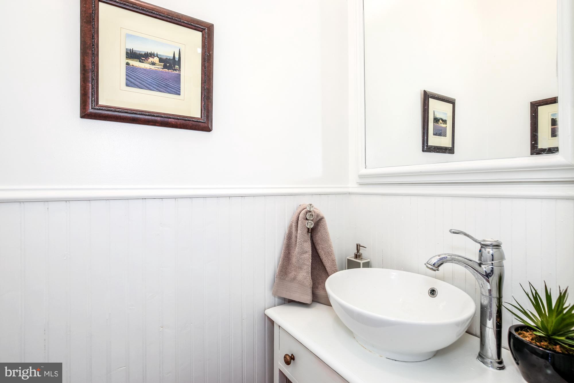 151 Thomas Street Northwest Washington, DC 20001 - Photo 13 of 40 a bathroom with a toilet and a sink