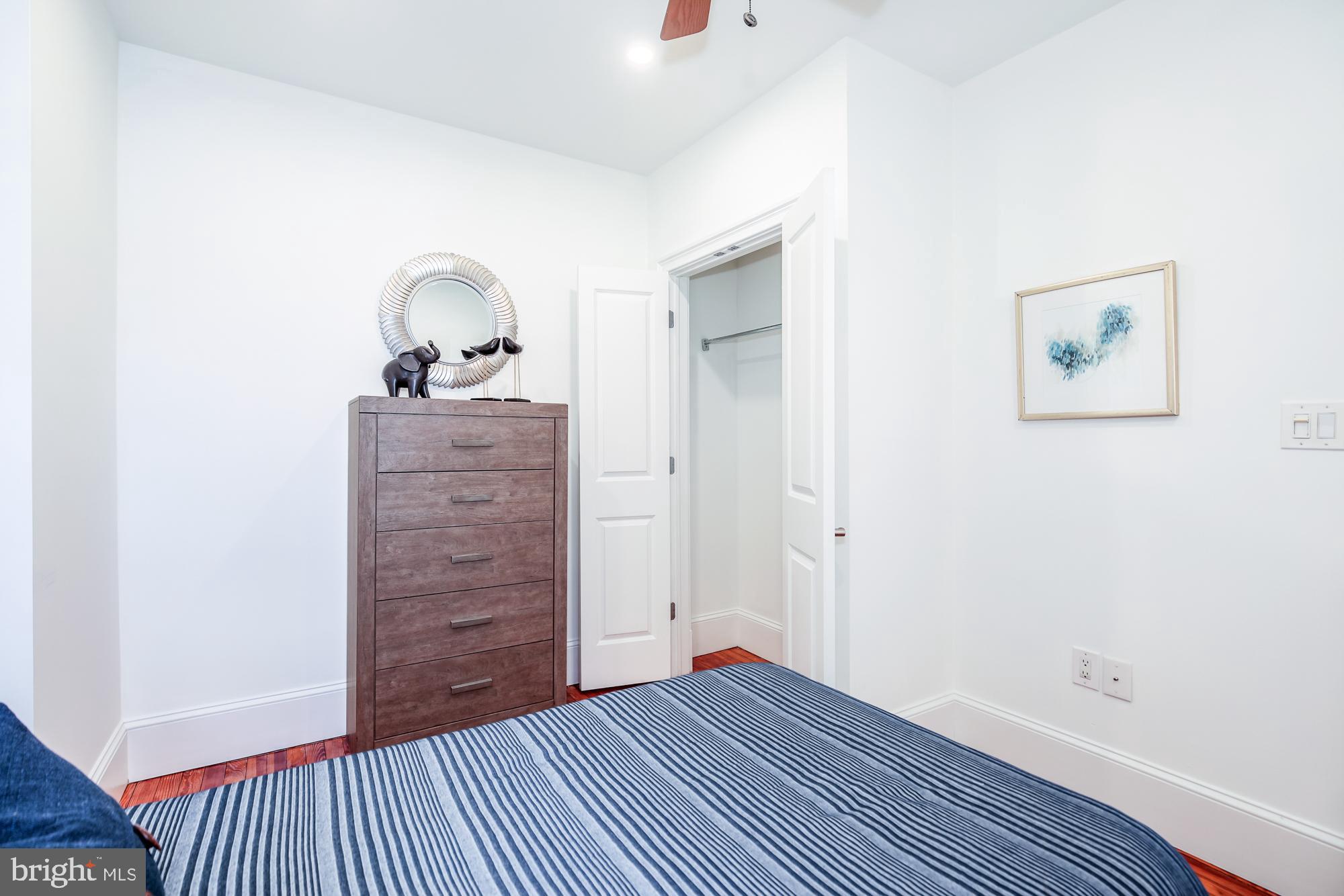 151 Thomas Street Northwest Washington, DC 20001 - Photo 23 of 40 a view of room with window and hardwood floor