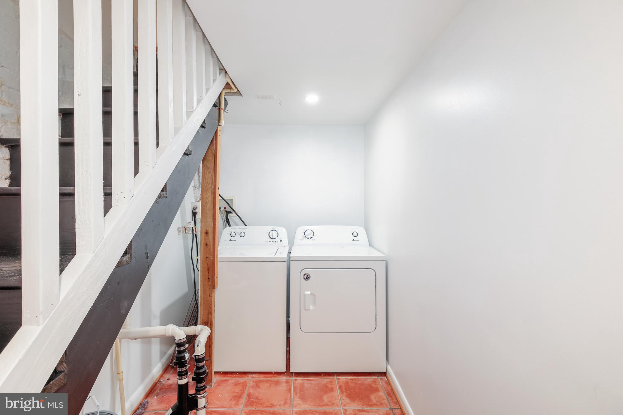 151 Thomas Street Northwest Washington, DC 20001 - Photo 24 of 40 a view of a hallway with washer and dryer