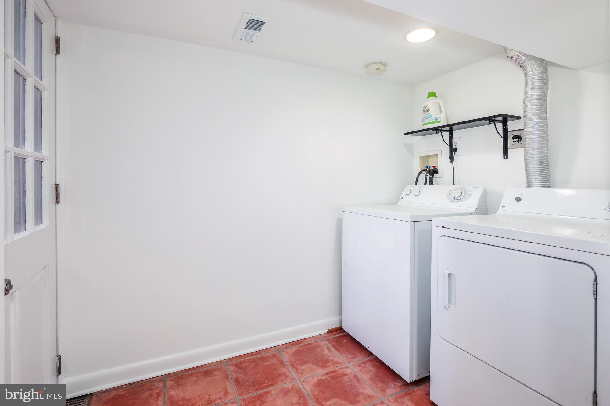 151 Thomas Street Northwest Washington, DC 20001 - Photo 33 of 40 a utility room with dryer and washer